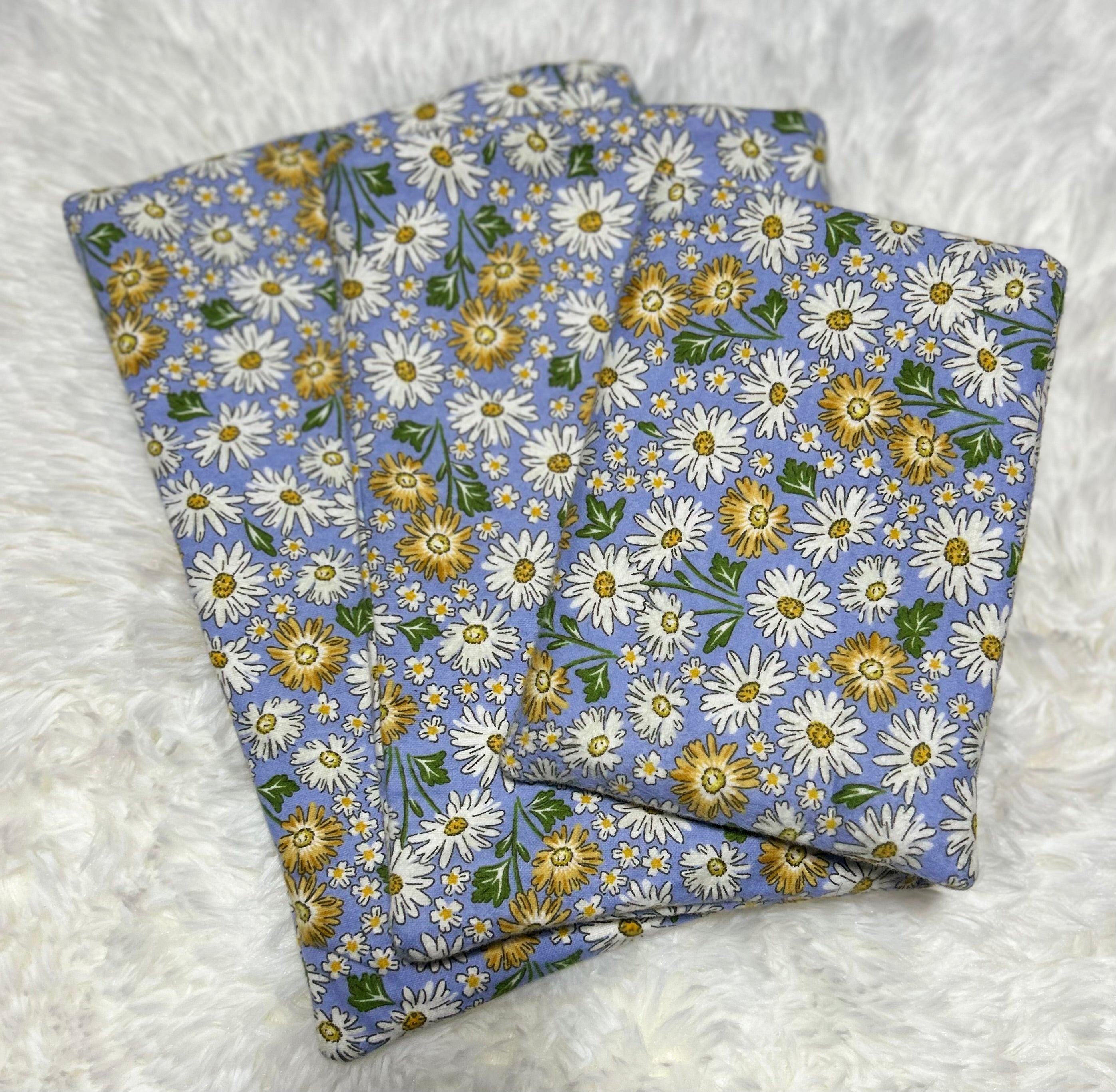 Daisy on Blue Book Sleeve