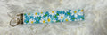 Turquoise Daisy Wristlet
